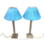 From the estate of the late Lady Wanda Boothby: a pair of white metal electric lamps with Corinthian