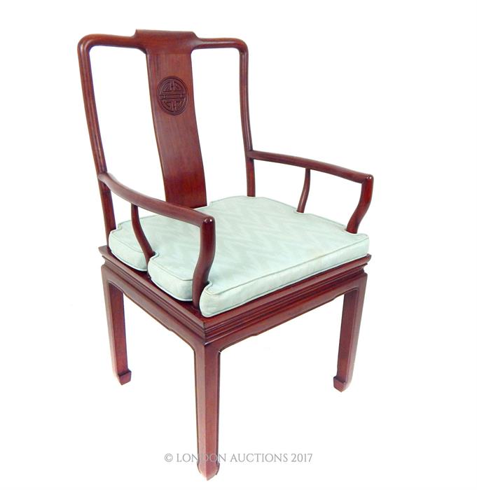 A Chinese, hardwood hall chair with mint green fitted seat cushion