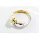 An 18ct yellow gold single stone diamond ring.