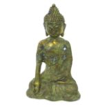 A bronzed Buddha figurine in seated meditative position; 26cm high.