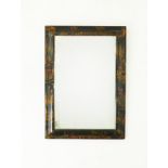 A rectangular Chinese wall mirror in a black lacquered frame