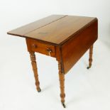 A small 19th century walnut Pembroke table