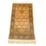 A pure silk Herek Turkish rug