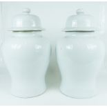 A pair of very large, Chinese, 20th century, white jars and covers