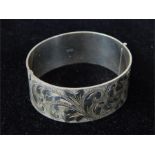 A substantial, vintage, engraved sterling silver cuff bangle