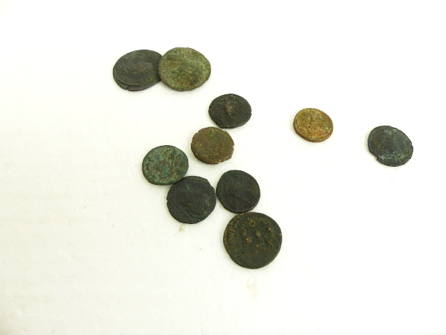 Ten Roman style bronze and copper coins.