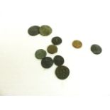 Ten Roman style bronze and copper coins.