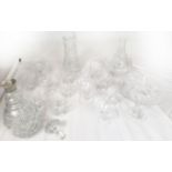 A collection of glass wares including a decanter with white metal collar.