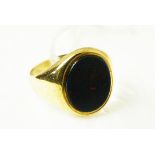 A gents 9ct gold and bloodstone ring