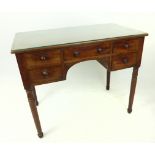 A Victorian mahogany writing desk/dressing table; 91cm wide; 74cm high.