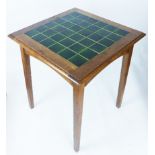 A Heals Arts and Crafts tile top oak occasional table