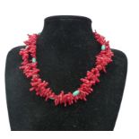 A sterling silver, red, natural coral and turquoise beaded necklace