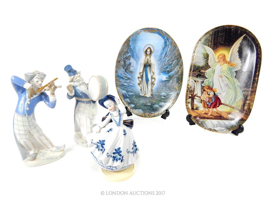 A collection of items including two Rex Valencia porcelain clown musicians, a musical figurine,