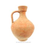 A large, Roman, terracotta jug with handle
