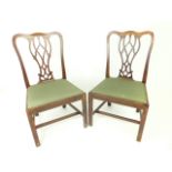 A pair of 19th century, Chippendale-style pierced, splat back, mahogany chairs
