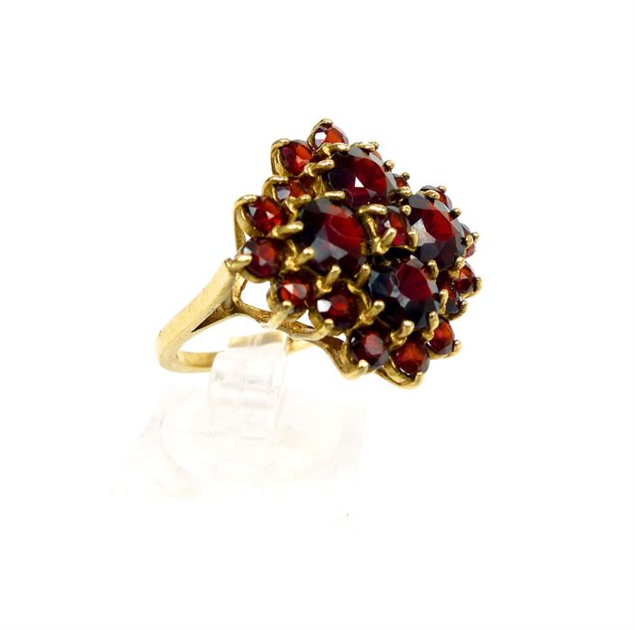 A stunning, vintage, large, 9 ct yellow gold and garnet, cluster cocktail ring