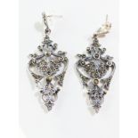 A pair of silver and marcasite earrings.