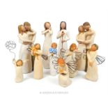 A collection of Willow Tree angel figures