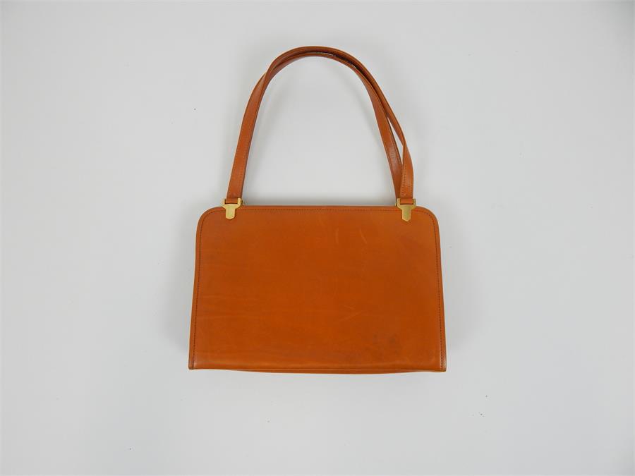 A vintage, unused, Asprey of London, brown calf leather handbag