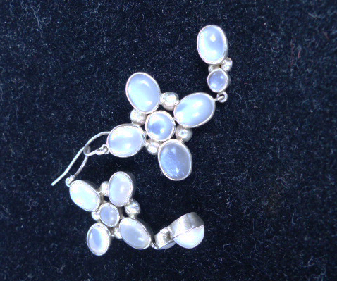 A pair of sterling silver, chunky, moonstone, cross earrings