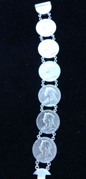 A Stirling silver coin bracelet