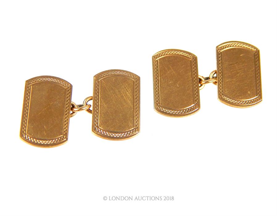A pair of 9 ct yellow gold cufflinks