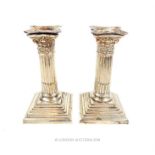 A pair of silver plated candlesticks, Goldsmiths & Silversmiths Company