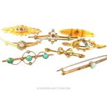 A collection of 15 ct and 9 ct yellow gold, antique, gem-set brooches