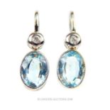 A pair of 18 ct white gold, diamond and aquamarine drop earrings
