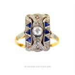 An 18 ct yellow gold and platinum, Art Deco, diamond and sapphire panel ring