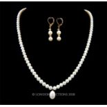 A 14 ct yellow gold clasped, natural, South Sea pearl suite