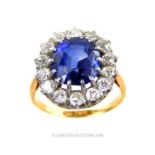 A ladies gold, sapphire (4.8ct) and diamond (1.25ct total) ring,
