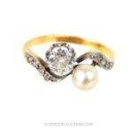 An 18 ct yellow gold and platinum, Art Nouveau, diamond and natural pearl ring