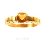 An 18 ct yellow gold, sugar loaf cut citrine, '22' ring by Van Cleef and Arpels