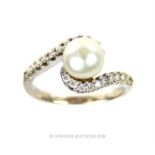 A 9 ct white gold, diamond and white cultured pearl ring