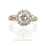 A substantial, 18 ct white gold and diamond cluster ring