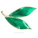 A vintage, large, silver gilt and emerald-green enamel leaf brooch