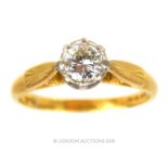 An 18 ct yellow gold, diamond solitaire ring