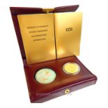 A cased, 22 ct yellow gold, Belgian 50 ECU coin and silver coin