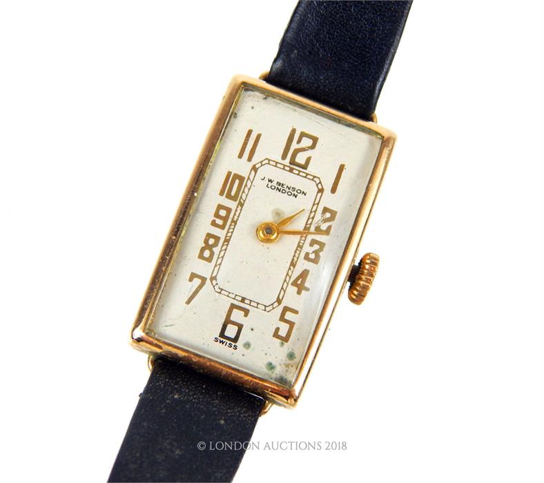 A 9 ct yellow gold, rectangular, Art Deco wristwatch by J.W. Benson