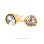 A striking pair of 14 ct yellow gold, antique, mogul-cut, diamond stud earrings