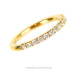 A 9 ct yellow gold, diamond, half-set eternity ring (0.50 carats total)