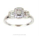 An exquisite, 18 ct white gold and 3 cluster diamond ring (0.60 carats)