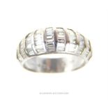 An 18 ct white gold, French, vintage, baguette diamond ring