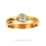 A 9 ct yellow gold, diamond solitaire ring (0.38 carats)