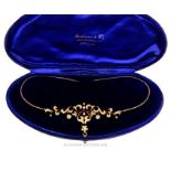 A boxed, mid-Victorian, 18 ct yellow gold and seed pearl studded necklace