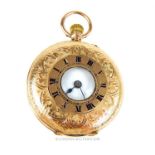 A 9 ct yellow gold, half hunter pocket watch with finely engraved case