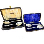 A cased pair of late Victorian sterling silver preserve spoons