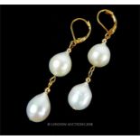 A pair of fine, 14 ct yellow gold and South Sea Akoya pearl, drop earrings