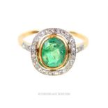 An 18 ct yellow gold and platinum, Art Deco, emerald and diamond cluster ring